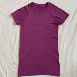 Lululemon Swiftly Tech Purple Short Sleeve Shirt Hip length. size 2